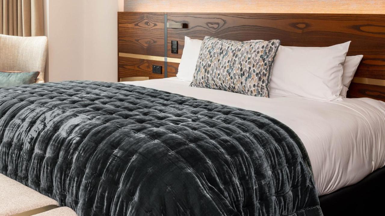 Horizon By Skycity Auckland Exterior foto A bed with a throw